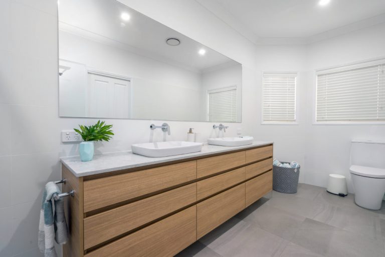 wooden bathroom vanity, mirror, white wall tiles, grey floor tiles modern bathroom